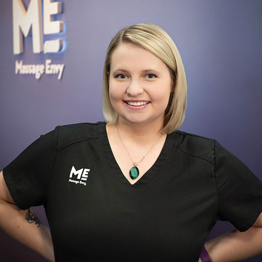 Massage therapist smiling
