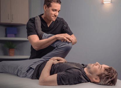 May lying on table during stretch session to improve flexibility and mobility. 