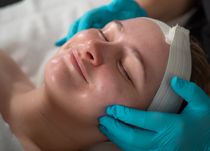 Woman relaxing during Zero Downtime Peel session at Massage Envy. 