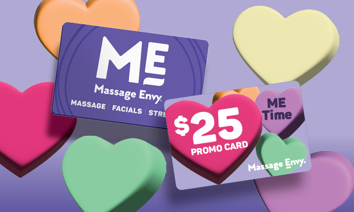 Close-up of a $25 Massage Envy promo card and gift card. 