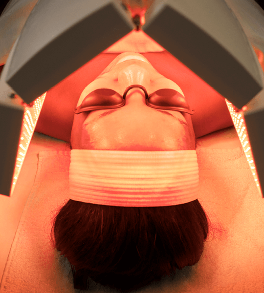 Woman receiving facial enhancement following oxygenating treatment at Massage Envy. 